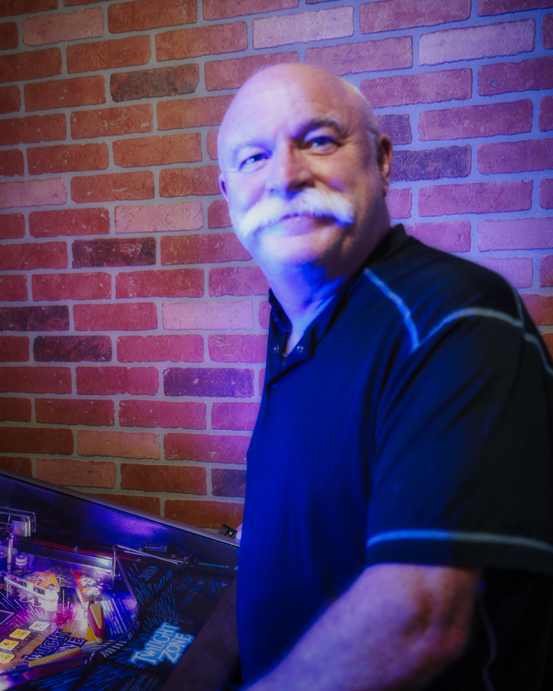 Male model photo shoot of mikefunphotography in Home Studio on my favorite pinball machine Twilight Zone