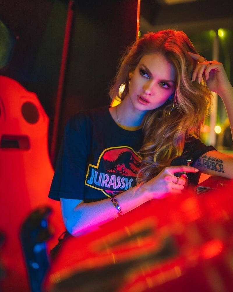 Female model photo shoot of AlexisAnne in Analog Arcade Bar