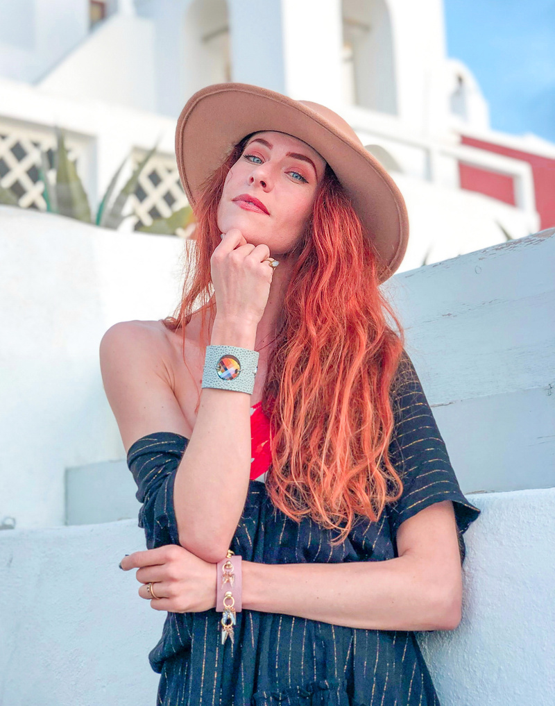 Female model photo shoot of Oliviarosegoes in Santorini, Greece