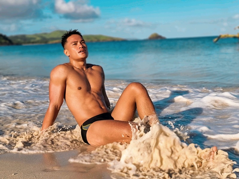Male model photo shoot of Linjun Moralde in calaguas Island