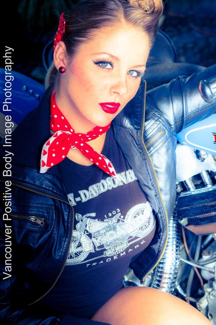 Female model photo shoot of Blood and Beauty in Harley Davidson Museum Vancouver