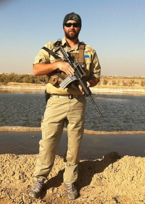 Male model photo shoot of M Brett Gibson in Iraq
