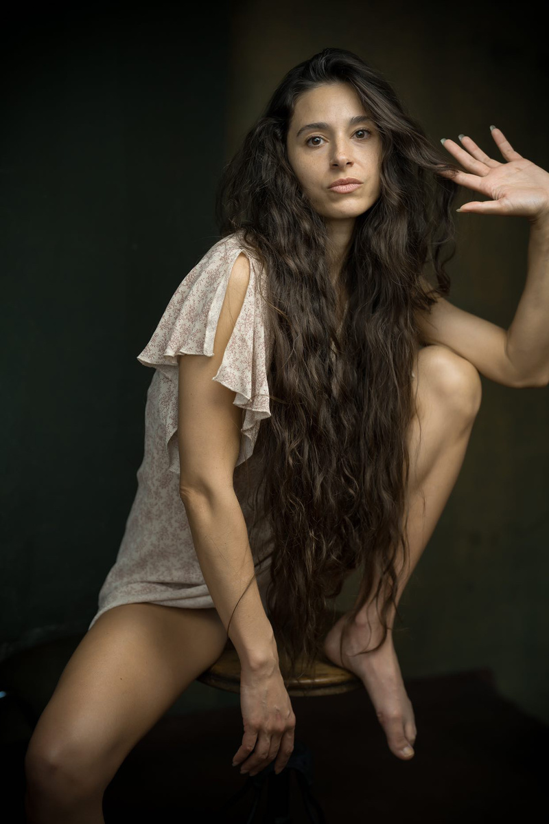 Female model photo shoot of Thirteendarkfeathers