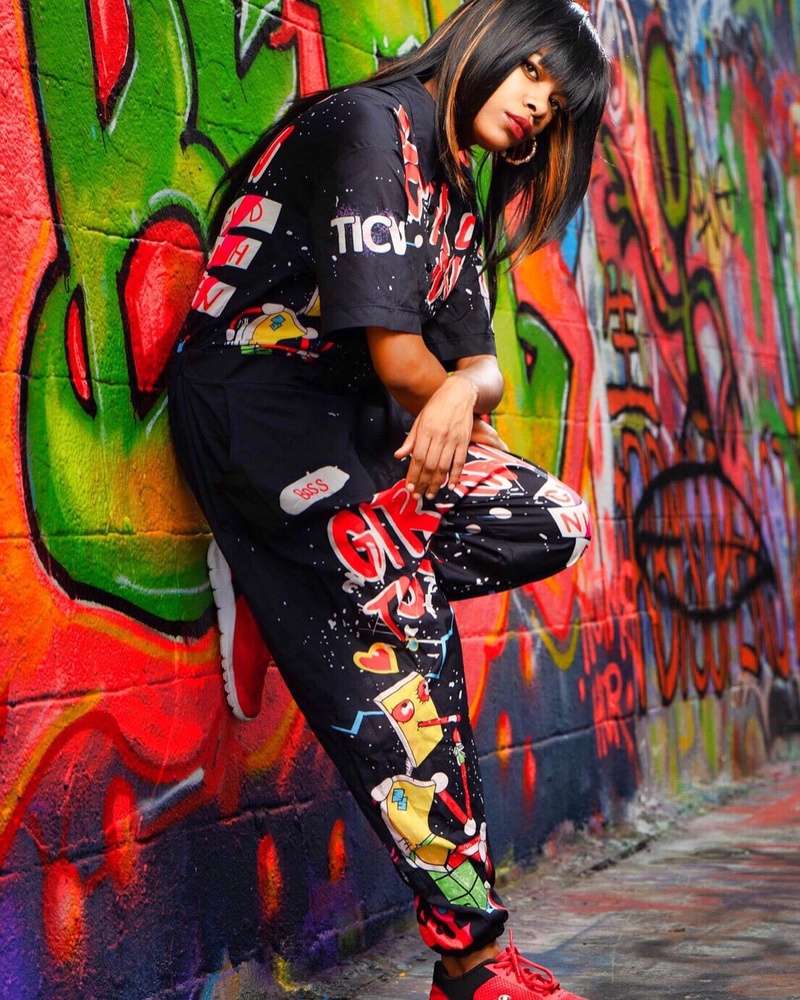 Female model photo shoot of Dollface_Shananigan in Graffiti Warehouse
