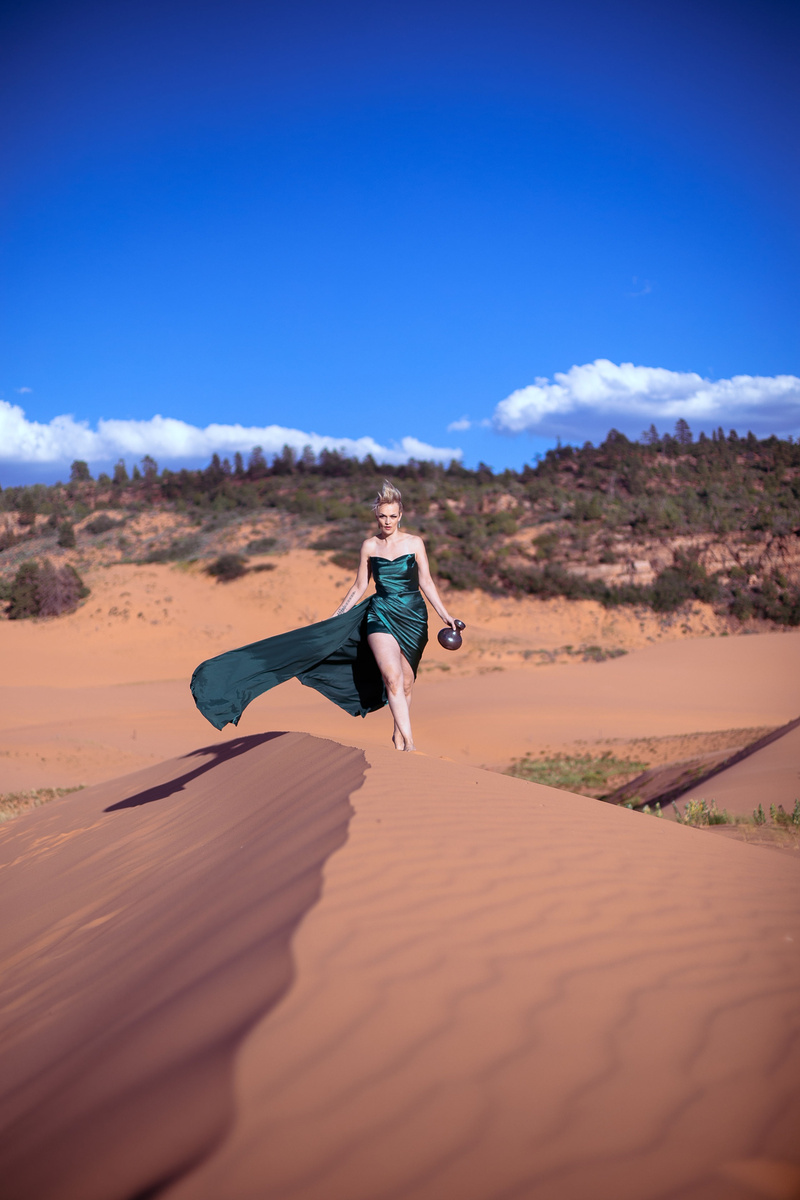 Female model photo shoot of Carleen Williams in Coral Pink Sand Dunes