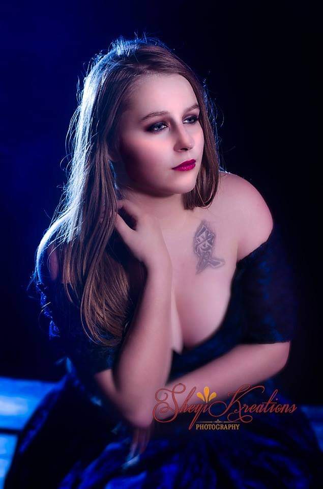 Female model photo shoot of Cherry Velvet by SheyiKreations
