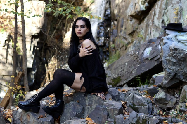 Female model photo shoot of Blackfeather