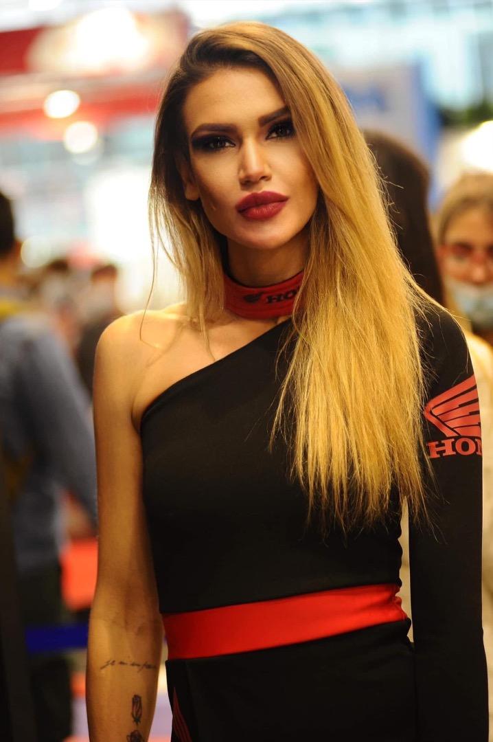 Female model photo shoot of Manuela Carmignani in Eicma-honda model