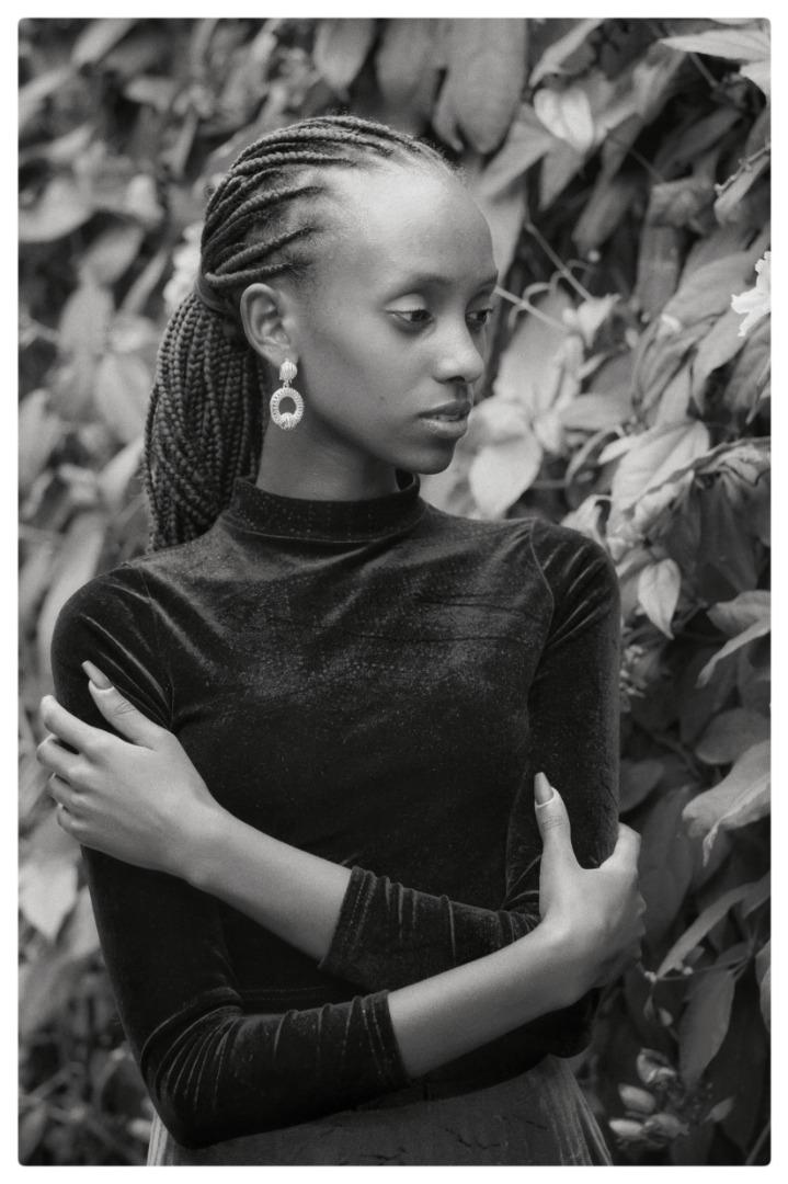 Female model photo shoot of Asher Tumaini by Yann Stavinsky in Nairobi