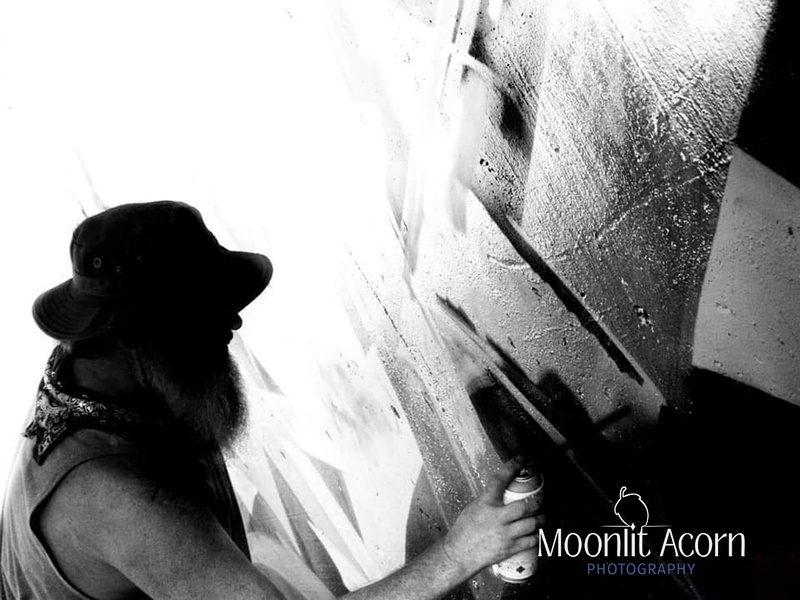 Male model photo shoot of Moonlit Acorn Photo in Austin Graffiti Walls