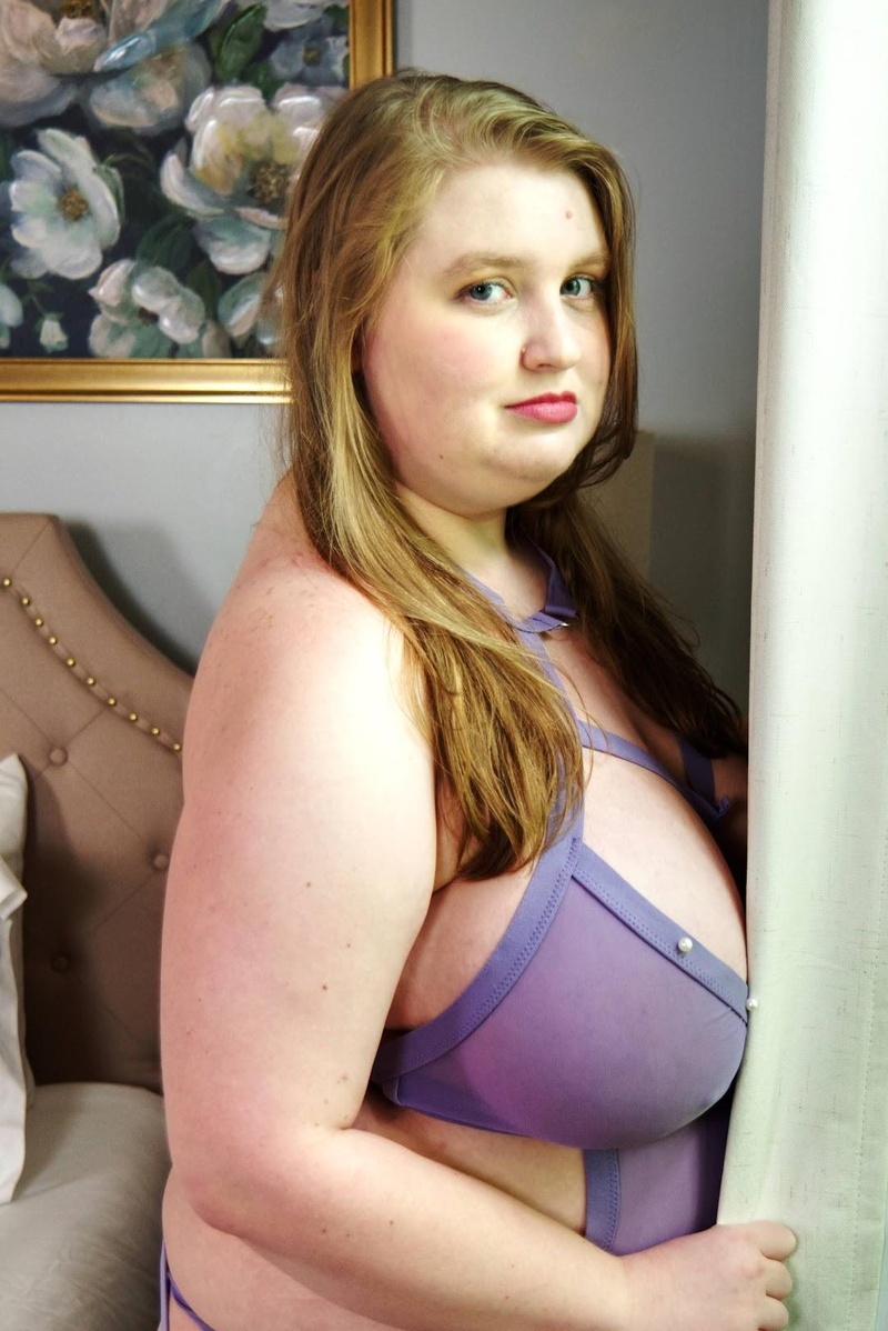 Female model photo shoot of Heather Vest by TrueSage