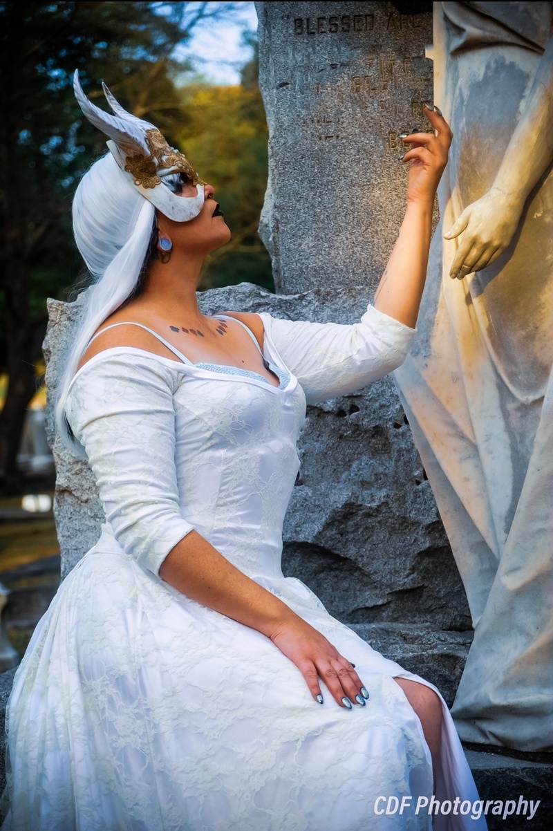 Female model photo shoot of Mistress Muse in Spring Hill Cemetery , Charlestin WV