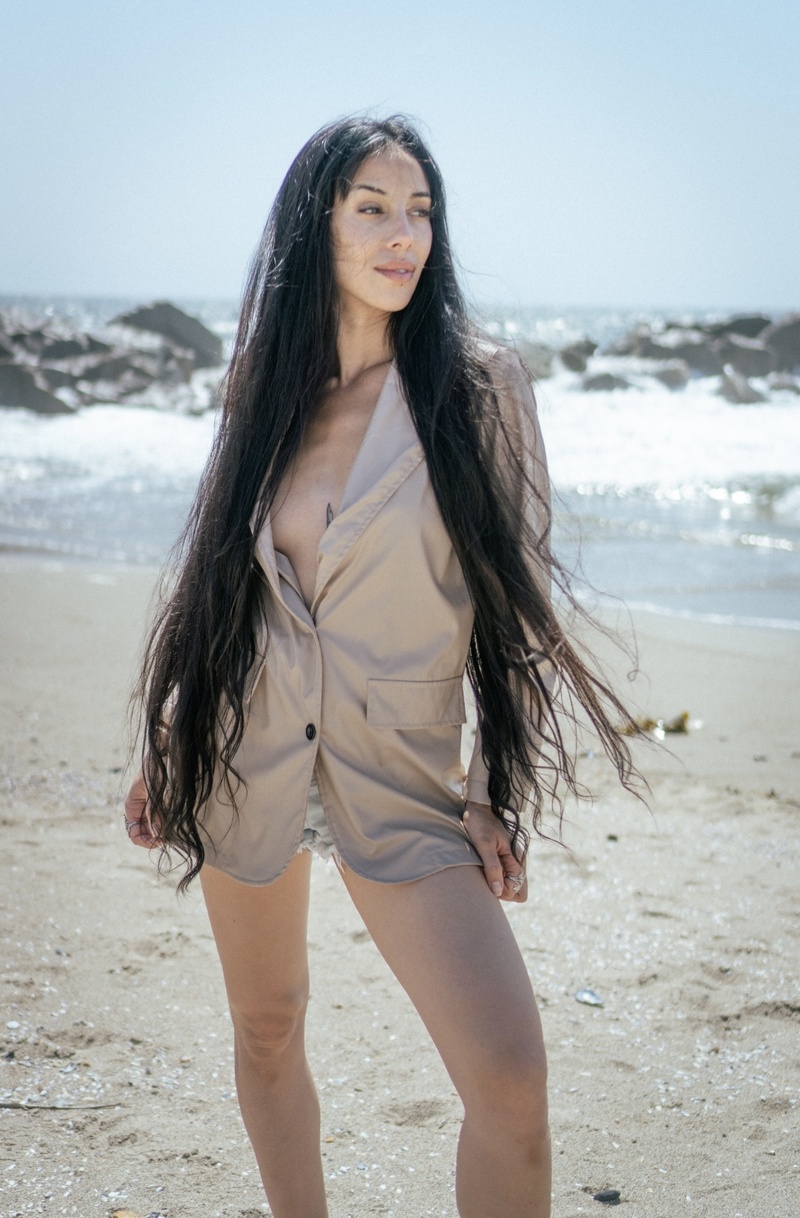 Female model photo shoot of Salma long hair in Santa Monica pier