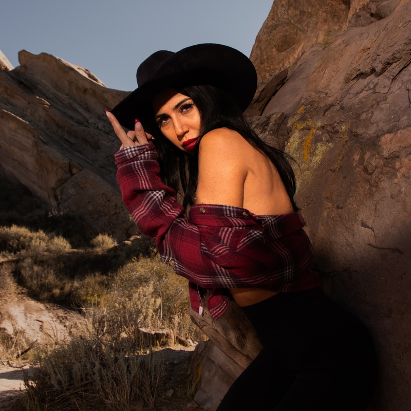 Female model photo shoot of mylifein__la by Makarian Photography in vasquez rocks