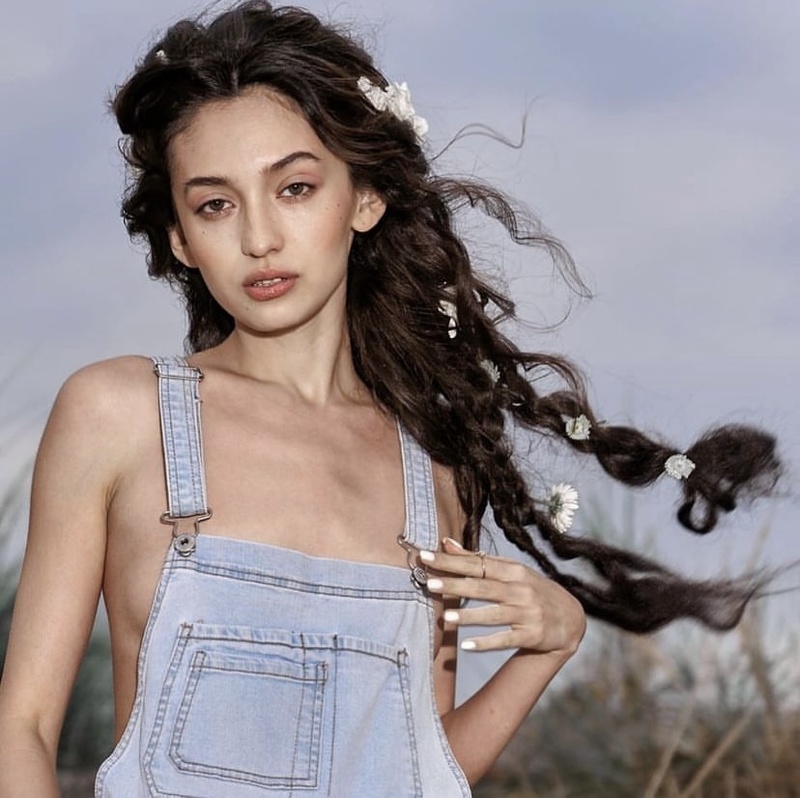 Female model photo shoot of Moxinur  Rayimkulova