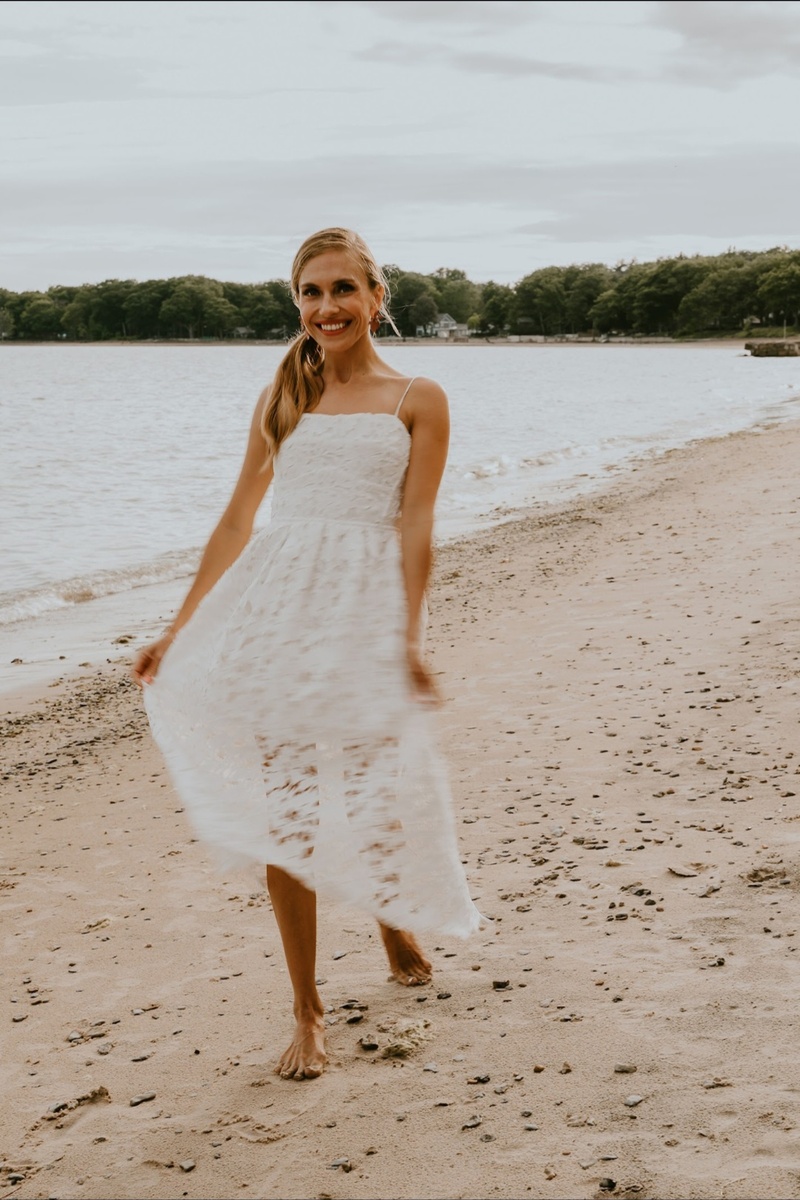 Female model photo shoot of Elina Smirnova in Lake Erie. Canada