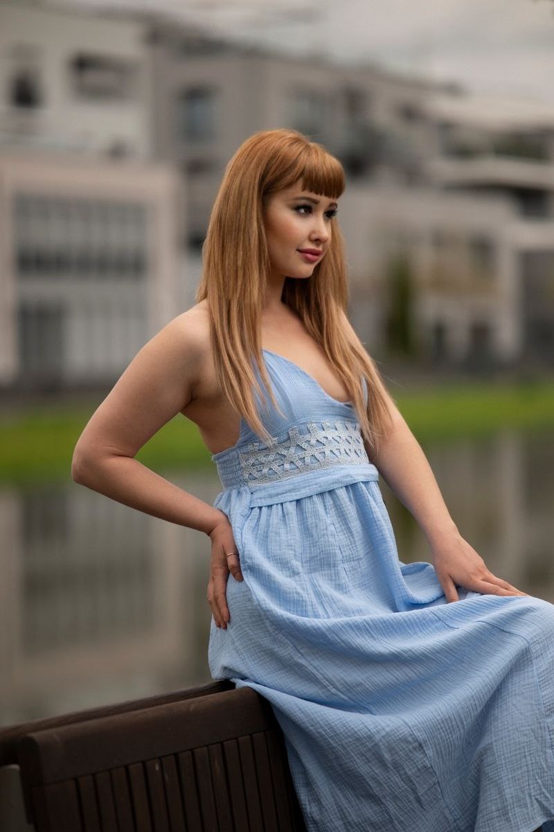 Female model photo shoot of teresa_model, clothing designed by lund_dressdesigner